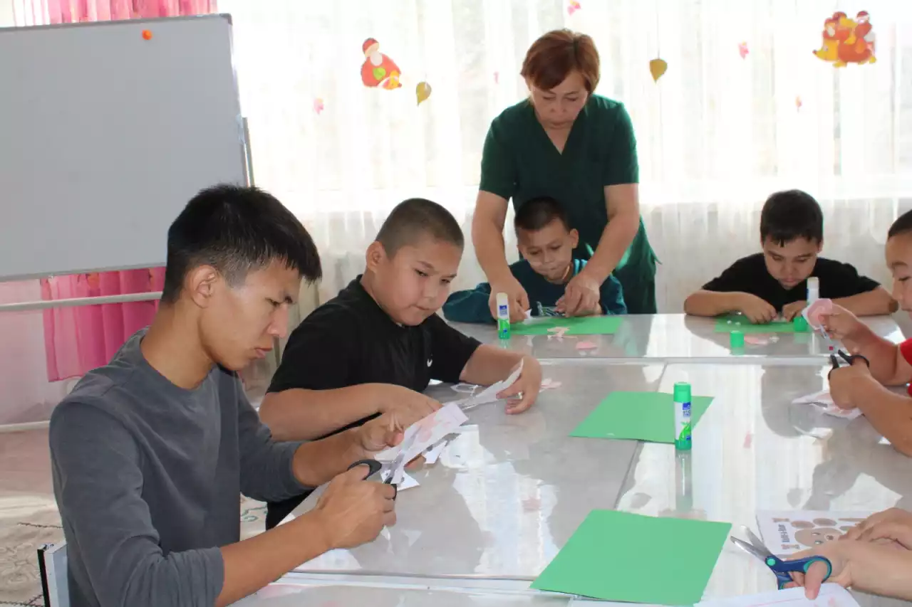 Қамқорлық  құшағында